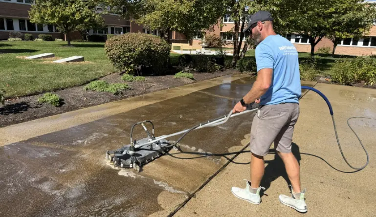 Concrete cleaning as part of preventative exterior cleaning for protecting home surfaces