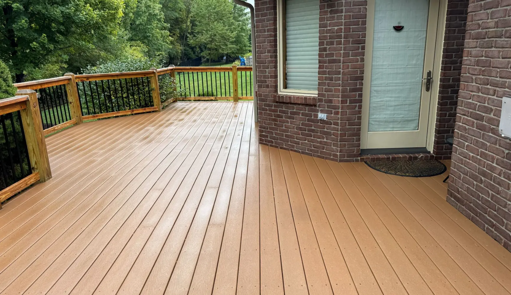 Clean back deck showcasing proper exterior cleaning for a well-maintained home outdoor space
