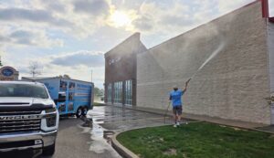 Indy Exterior Cleaning pressure washing a commercial property exterior