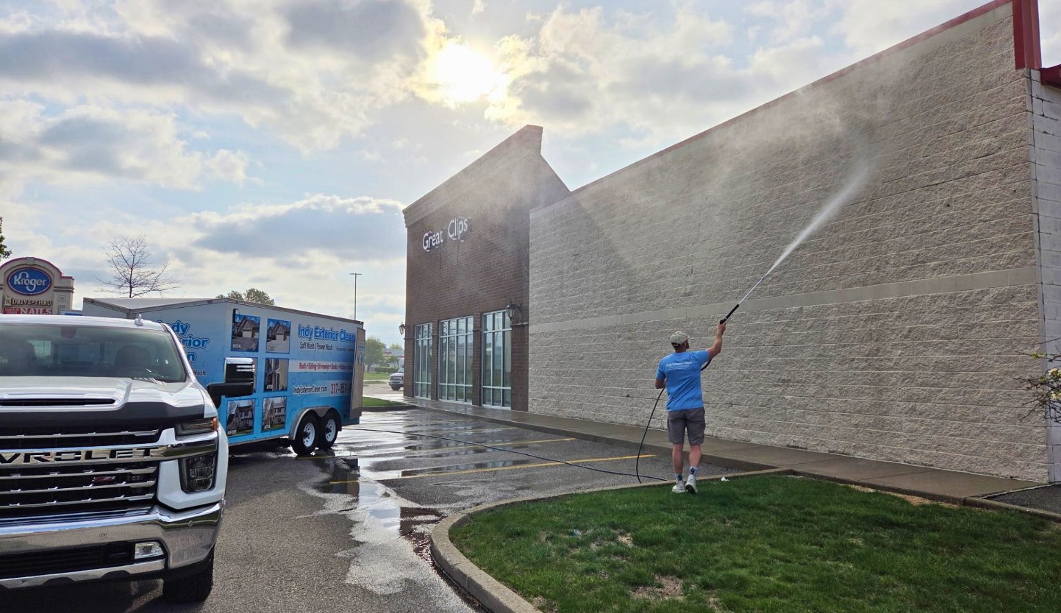 Indy Exterior Cleaning pressure washing a commercial property exterior